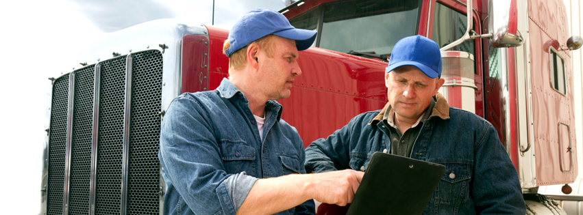 Modules provide information for disucssion with and among drivers. Image of two truck drivers having a discussion.